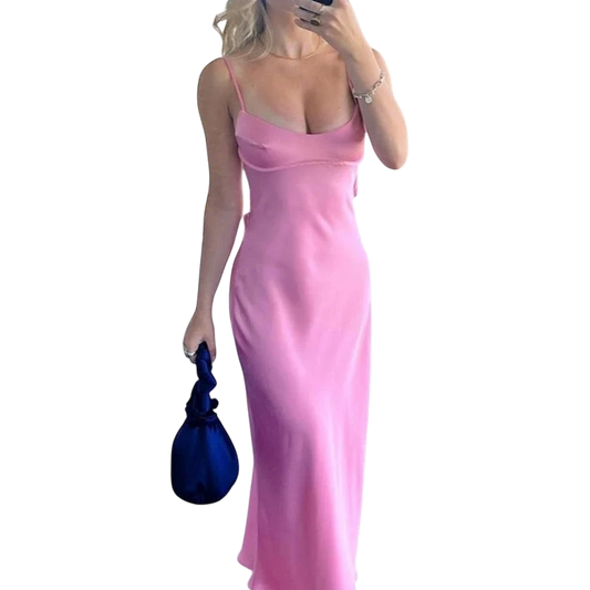Juno J pink satin slip maxi dress with cowl neck, spaghetti straps, and back cutout detail.